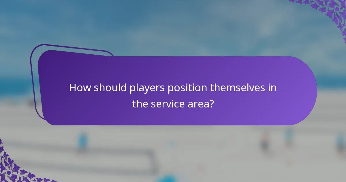 How should players position themselves in the service area?